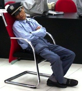 Sleeping on the job. Photo of guard sleeping