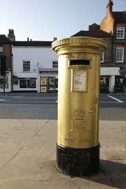 T’is the season to be… jolly miffed. Photo of golden post box