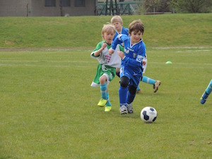 Play word association football when revising for exams - phot of children playing football