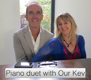 What does watching a reality show say about you? Photo of Kevin McCloud and Lysette Offley laying a piano duet
